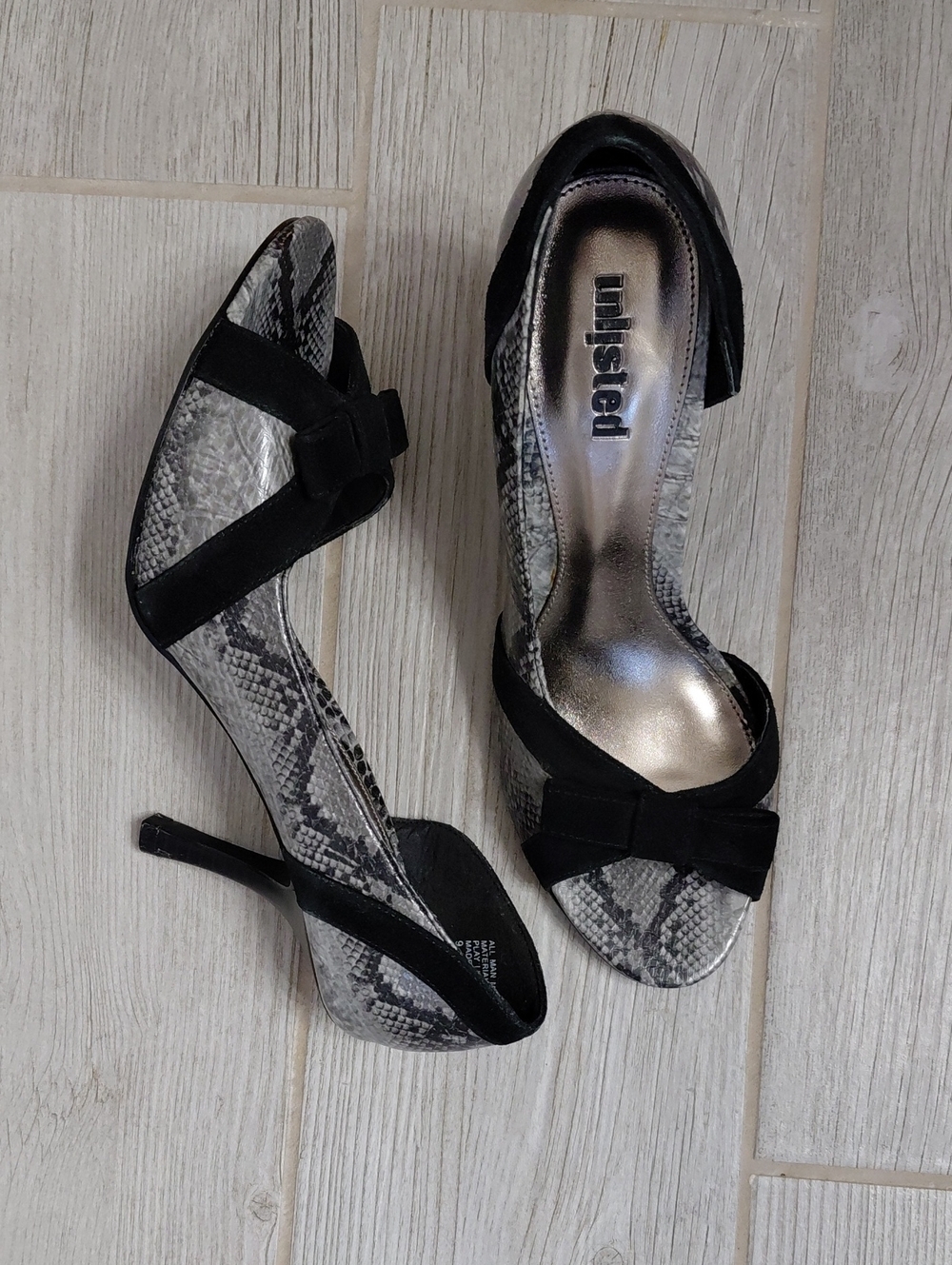 Snakeskin peep-toe high heels